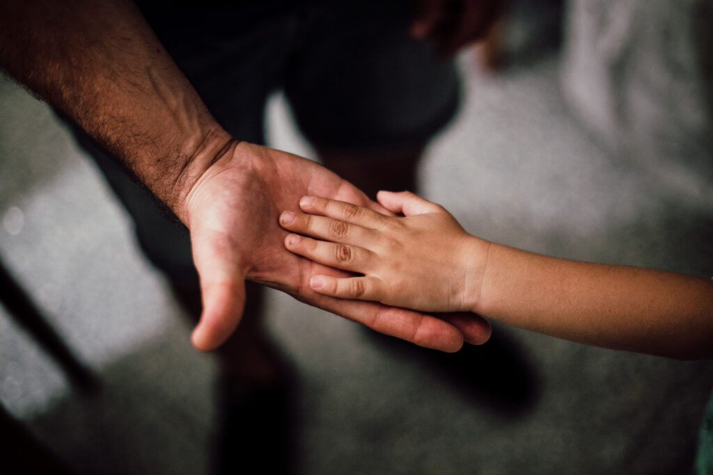 Selective Focus Photography of Child's Hand